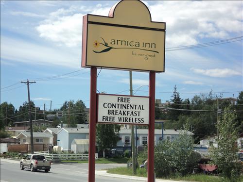 Arnica Inn Yellowknife Logo gambar